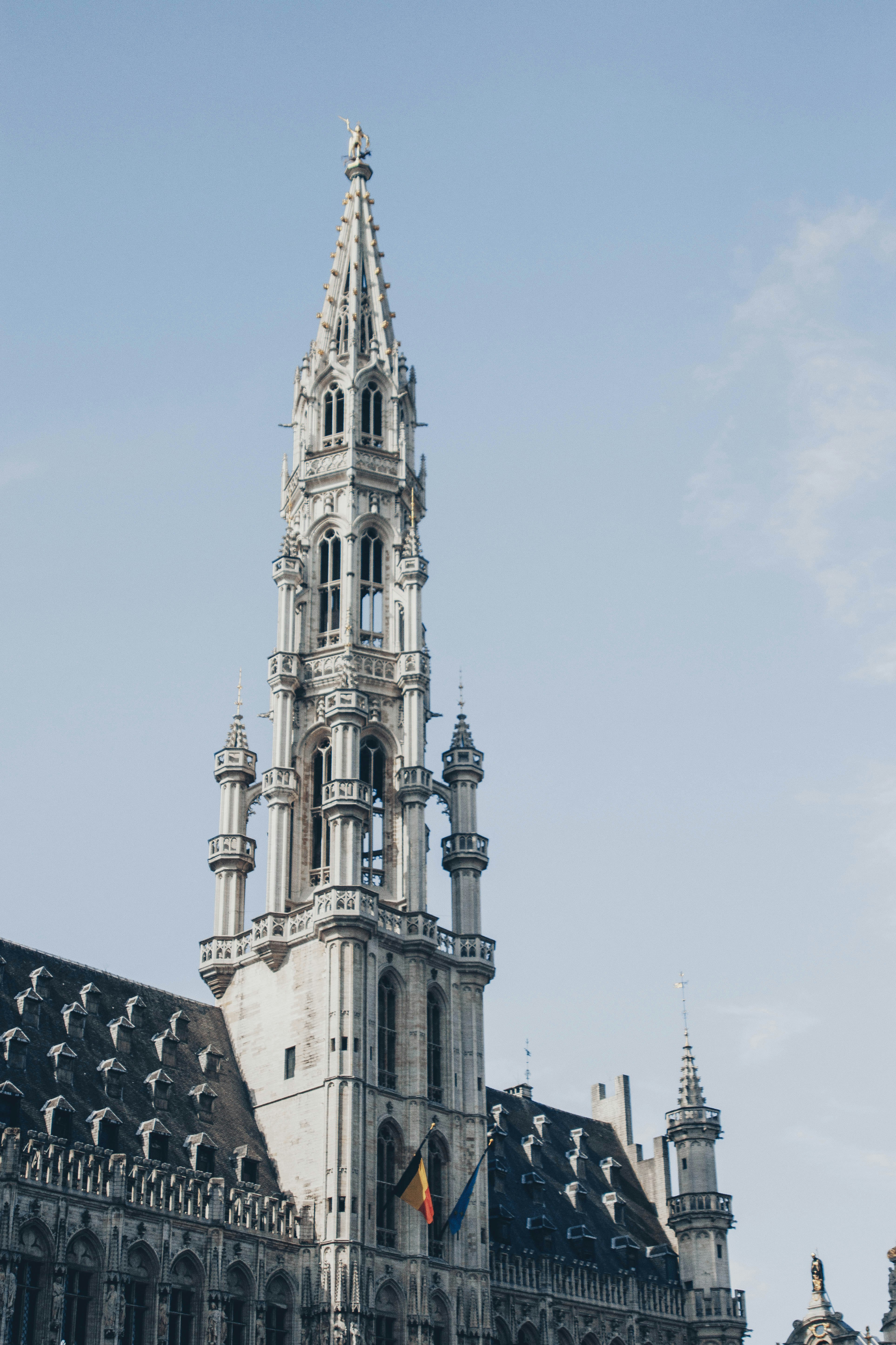Grand Place Market in the City of Brussels, Belgium under blue and white skies during daytime